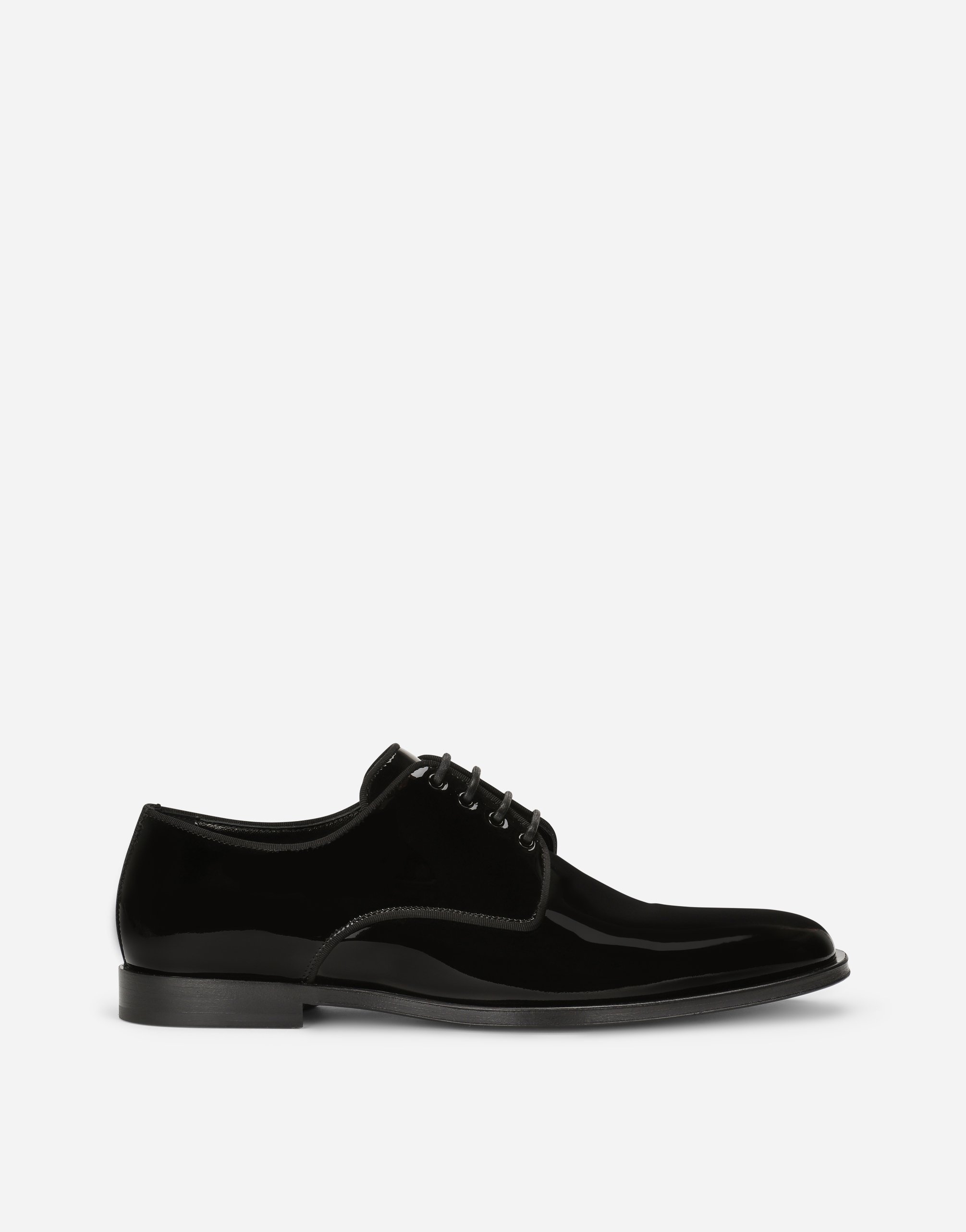 Glossy patent leather derby shoes in Black