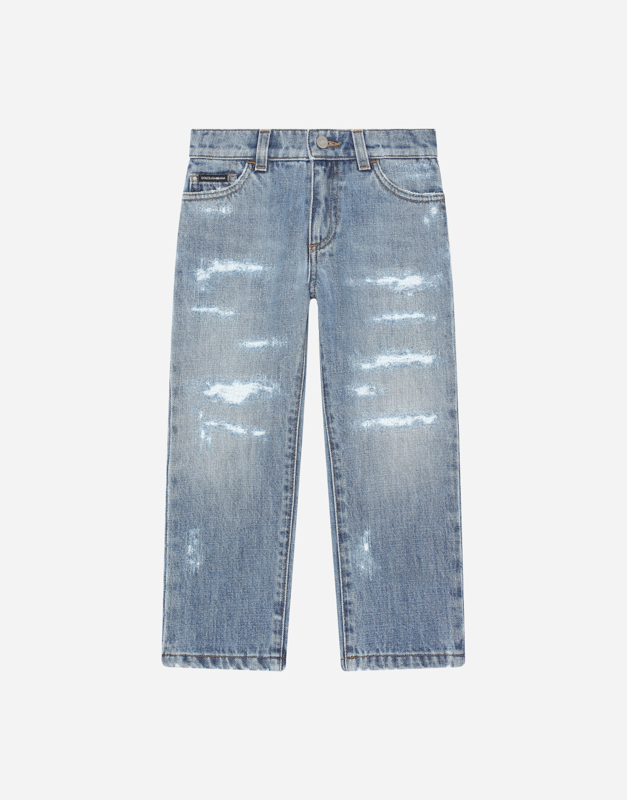 Washed denim jeans with abrasions in Multicolor