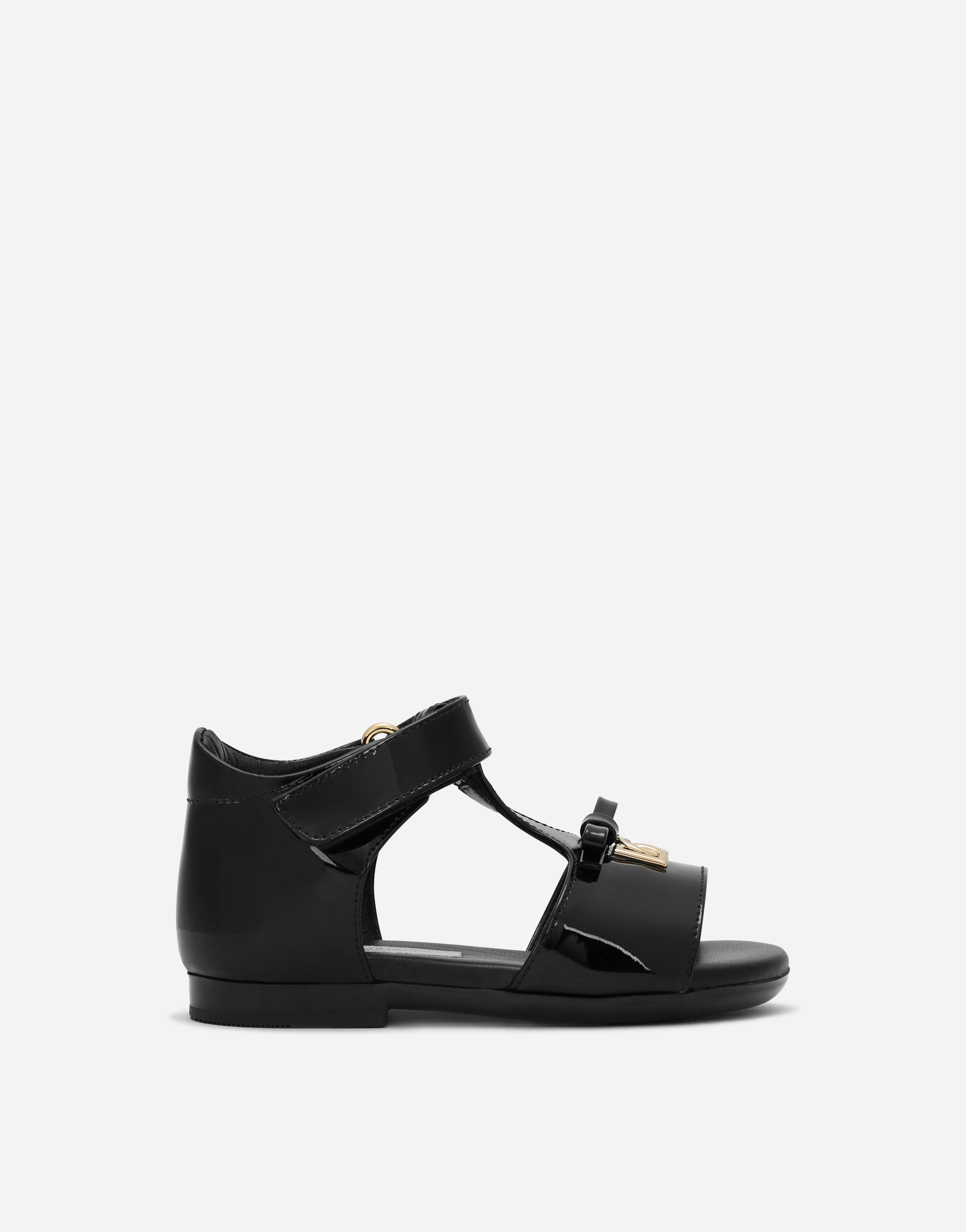 Patent leather first steps sandals with metal DG logo in Black