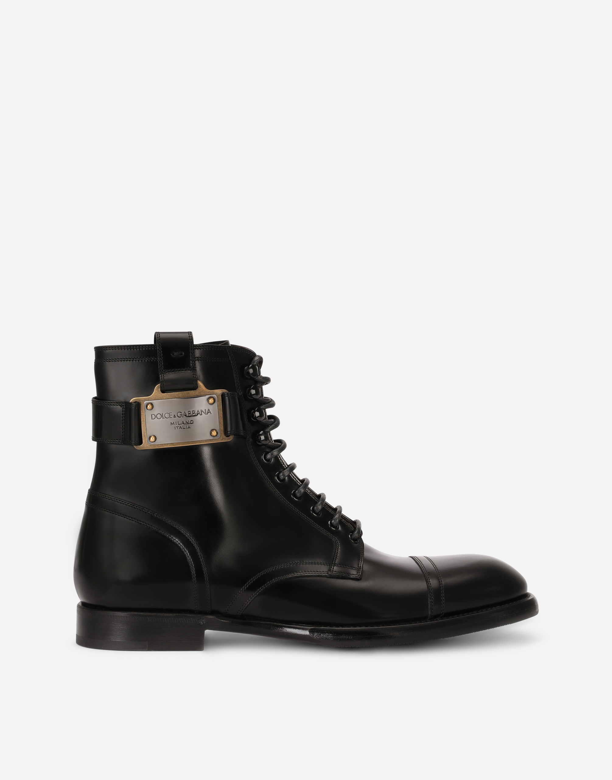 Brushed calfskin boots with branded plate in Black