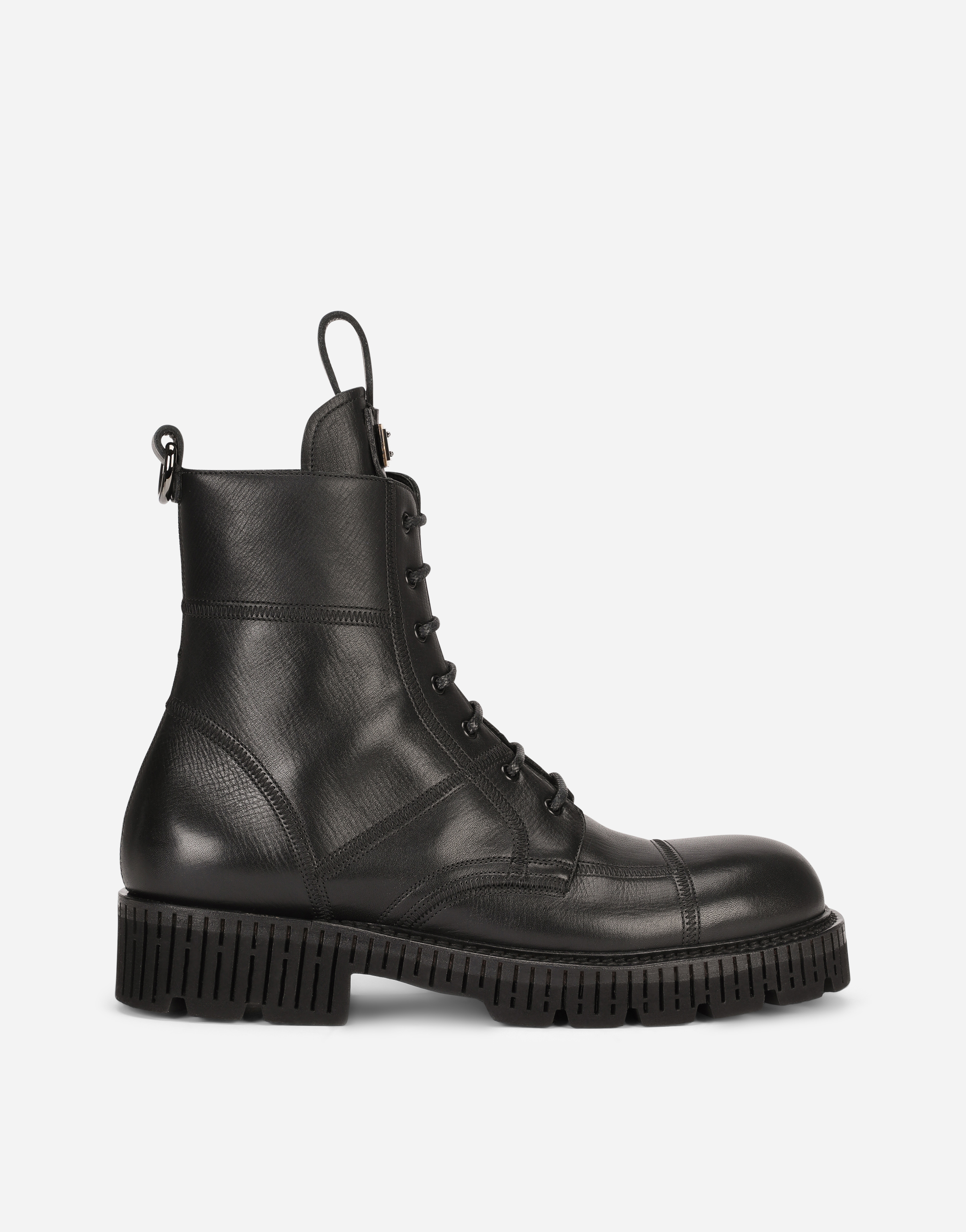 Boarded calfskin boots with extra-light sole in Black