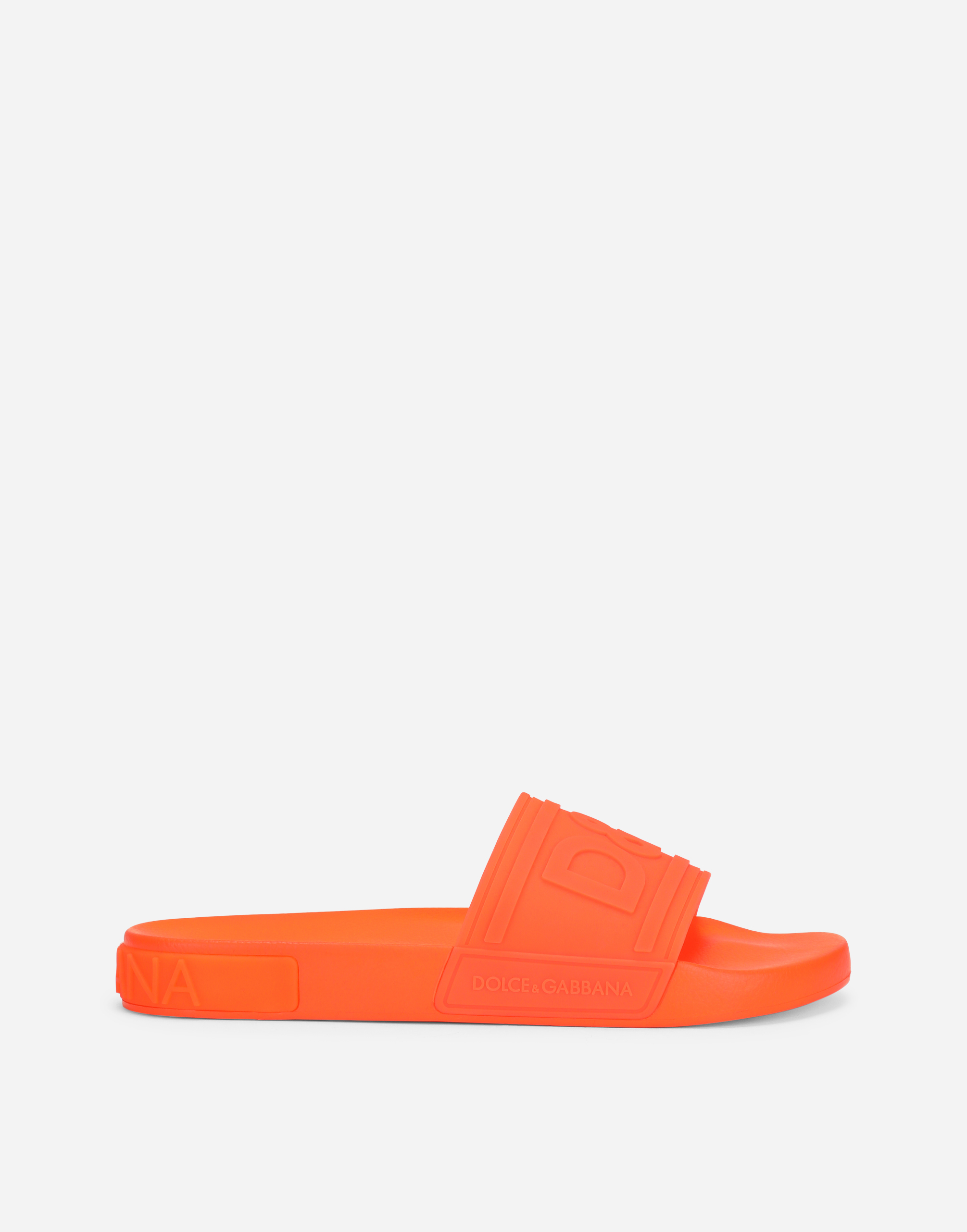 Rubber beachwear slides with high-frequency detailing  in Orange