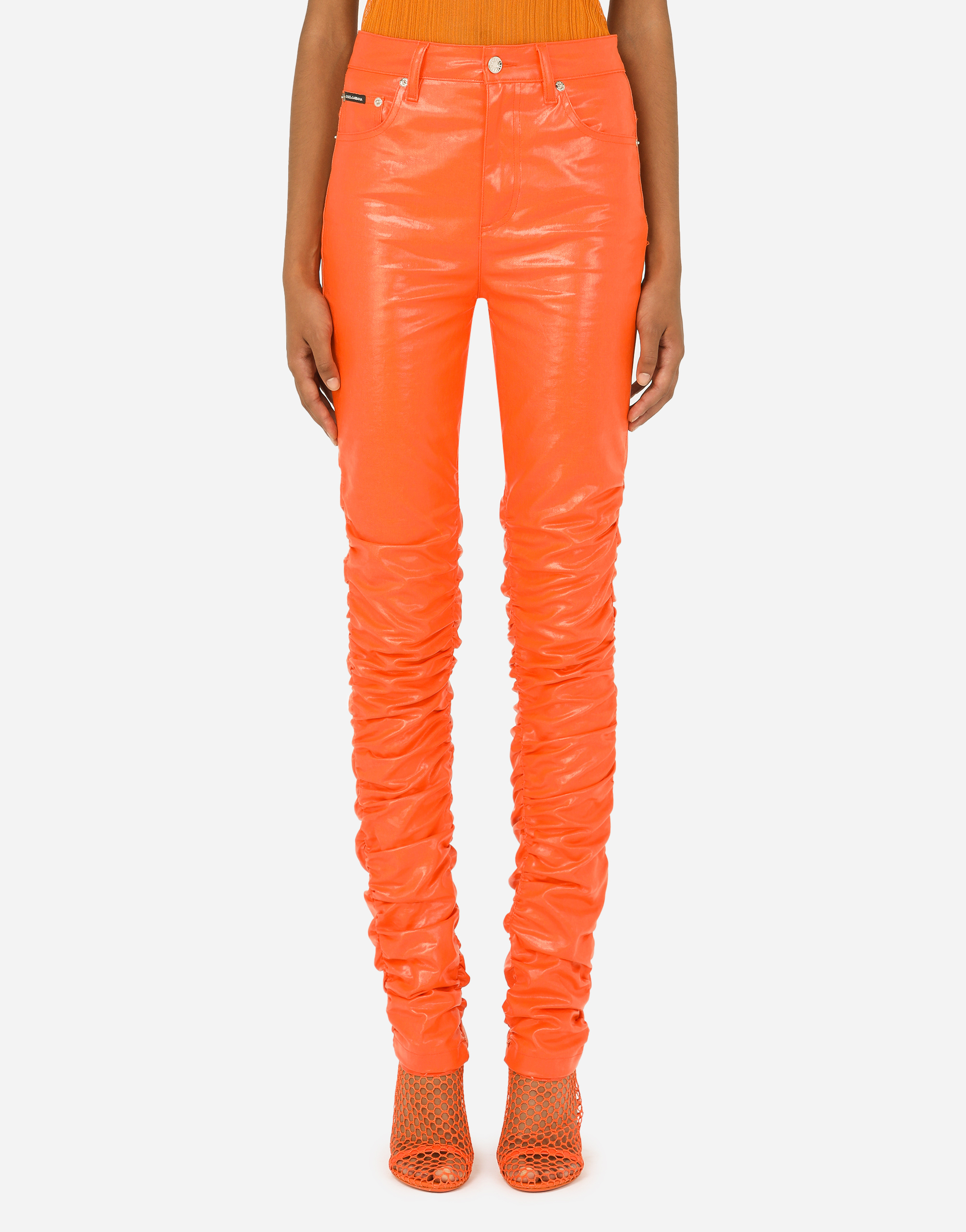 Coated cotton pants in Orange