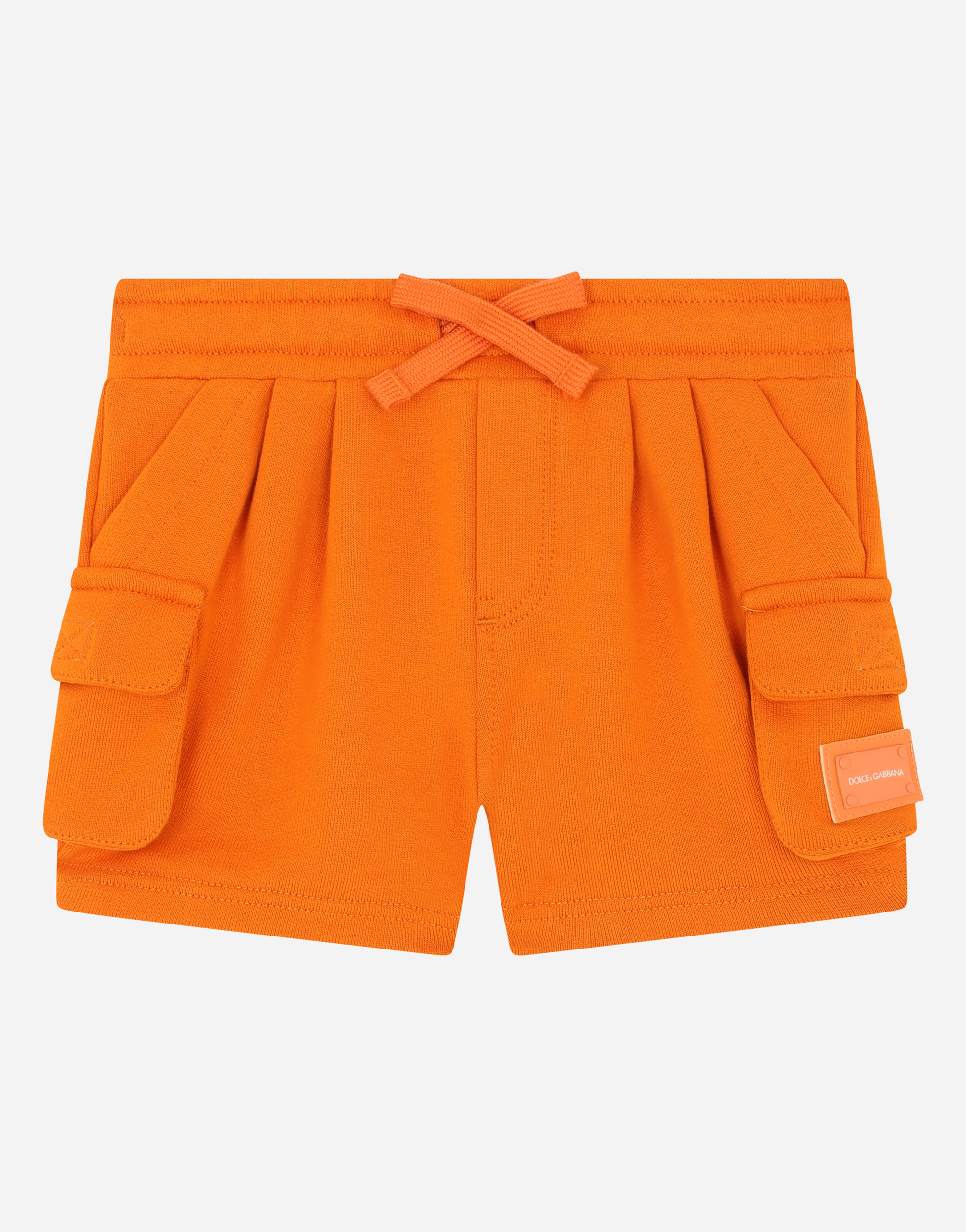 Jersey jogging shorts with logo plate in Orange