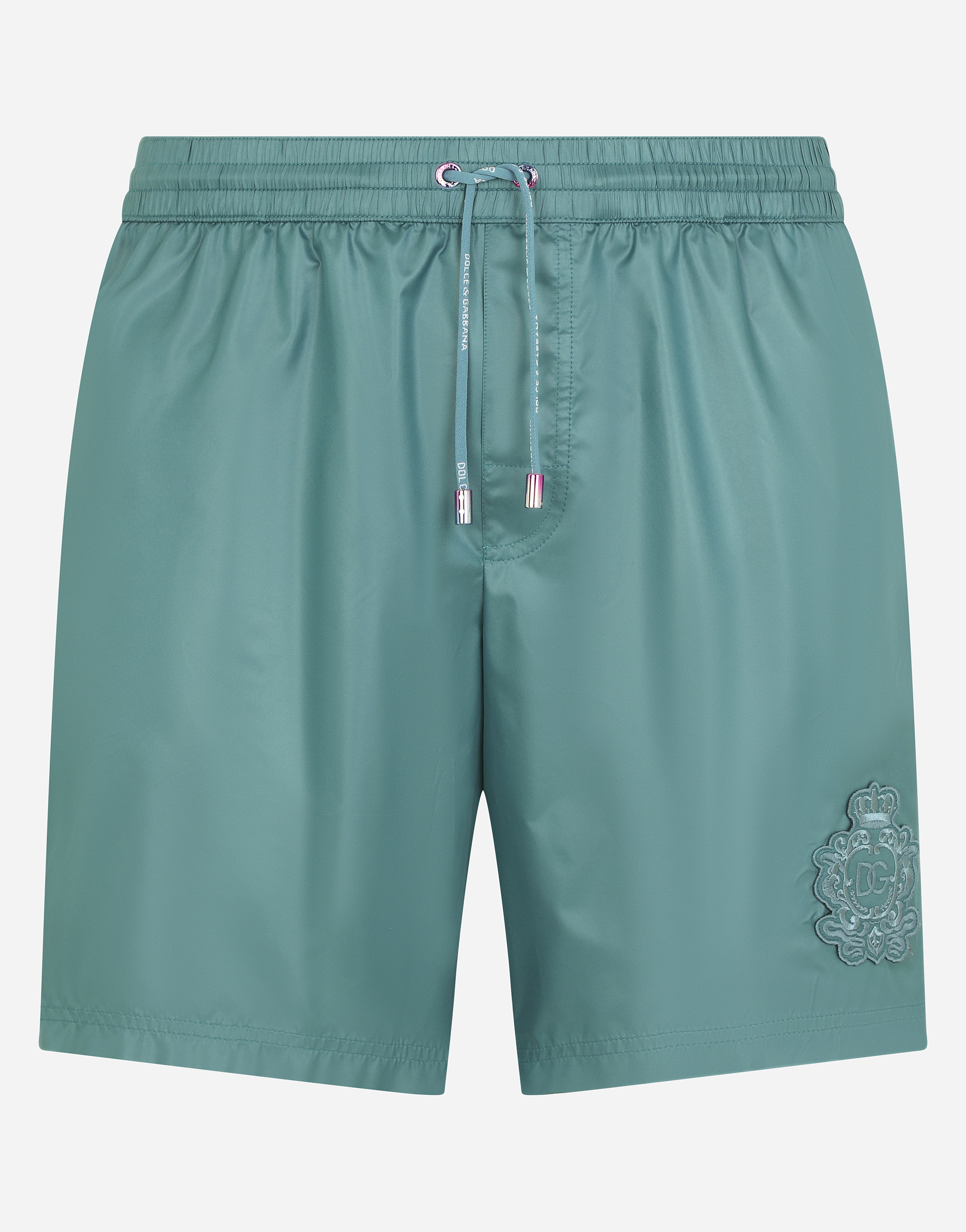 Mid-length swim trunks with heraldic patch in Blue