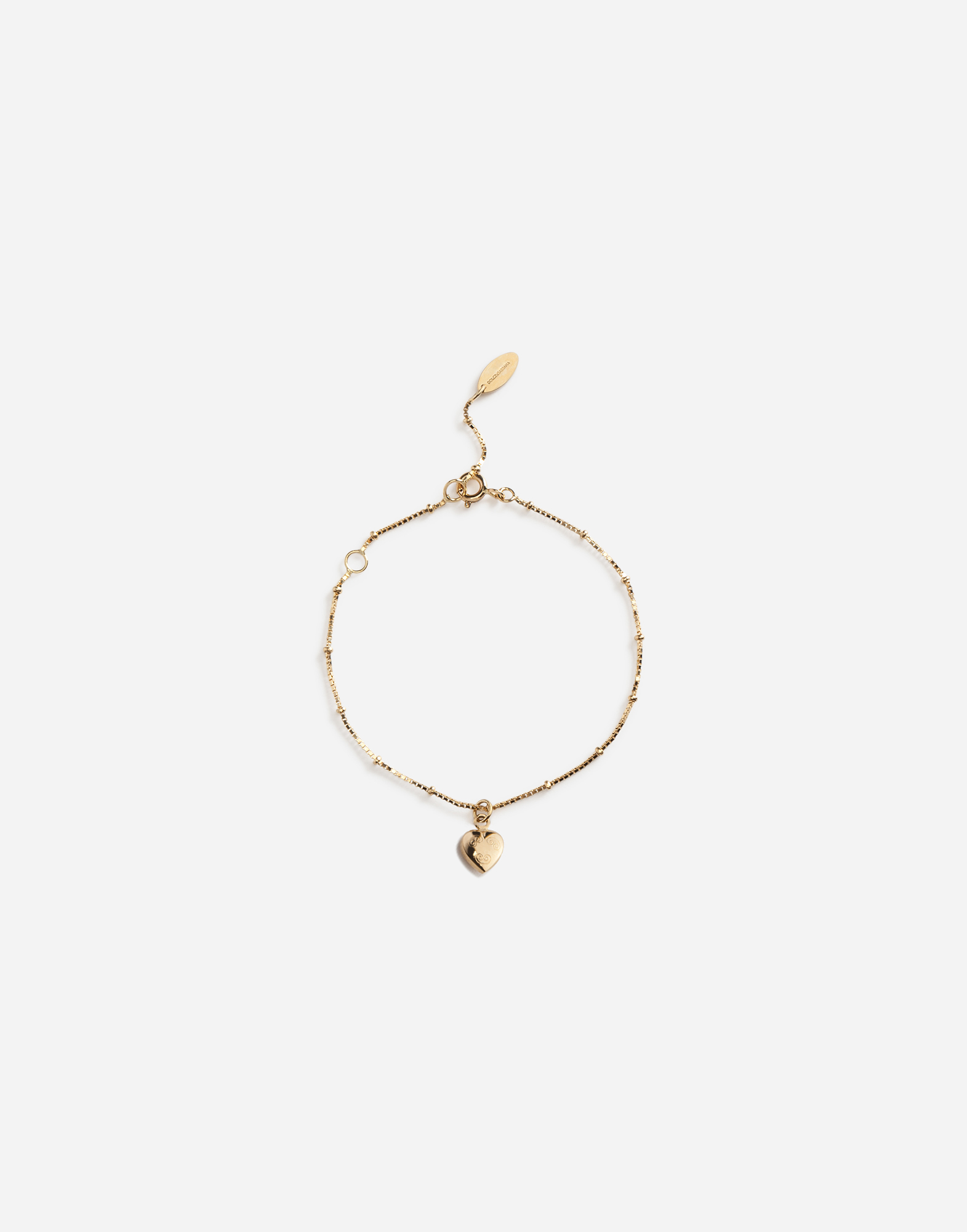 Bracelet with heart charm in Yellow Gold