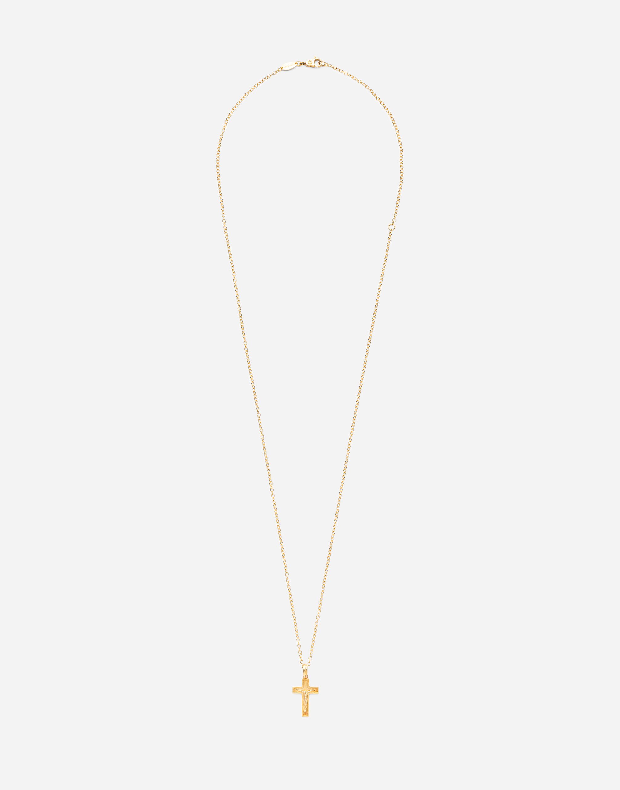 Cross pendant on yellow gold chain in Gold
