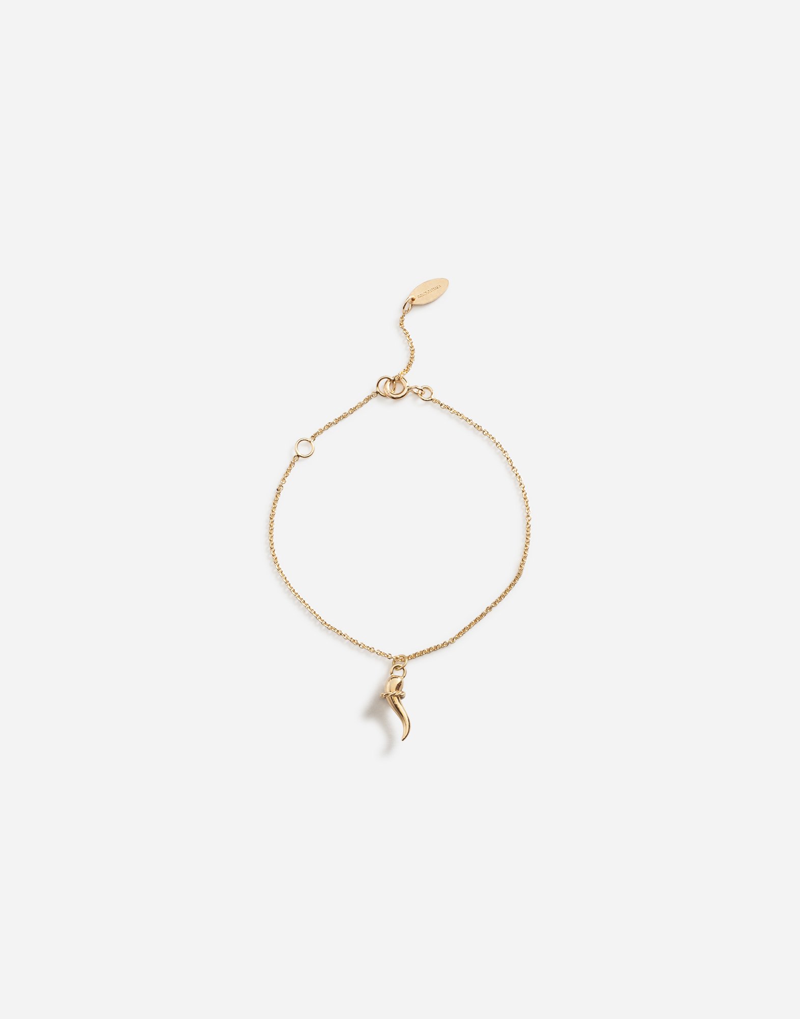 Bracelet with good luck charm in Gold