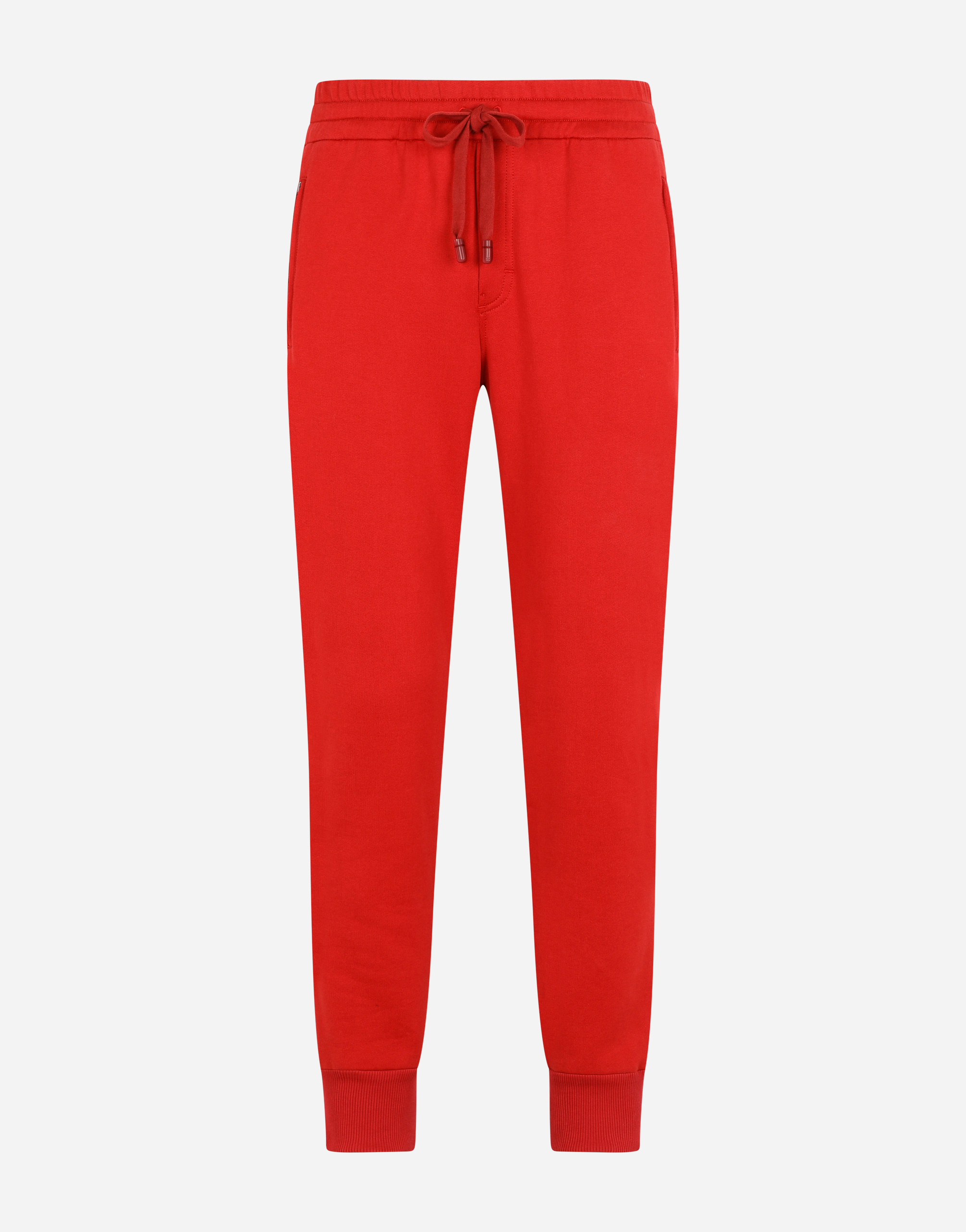 Jersey jogging pants with branded plate in Red