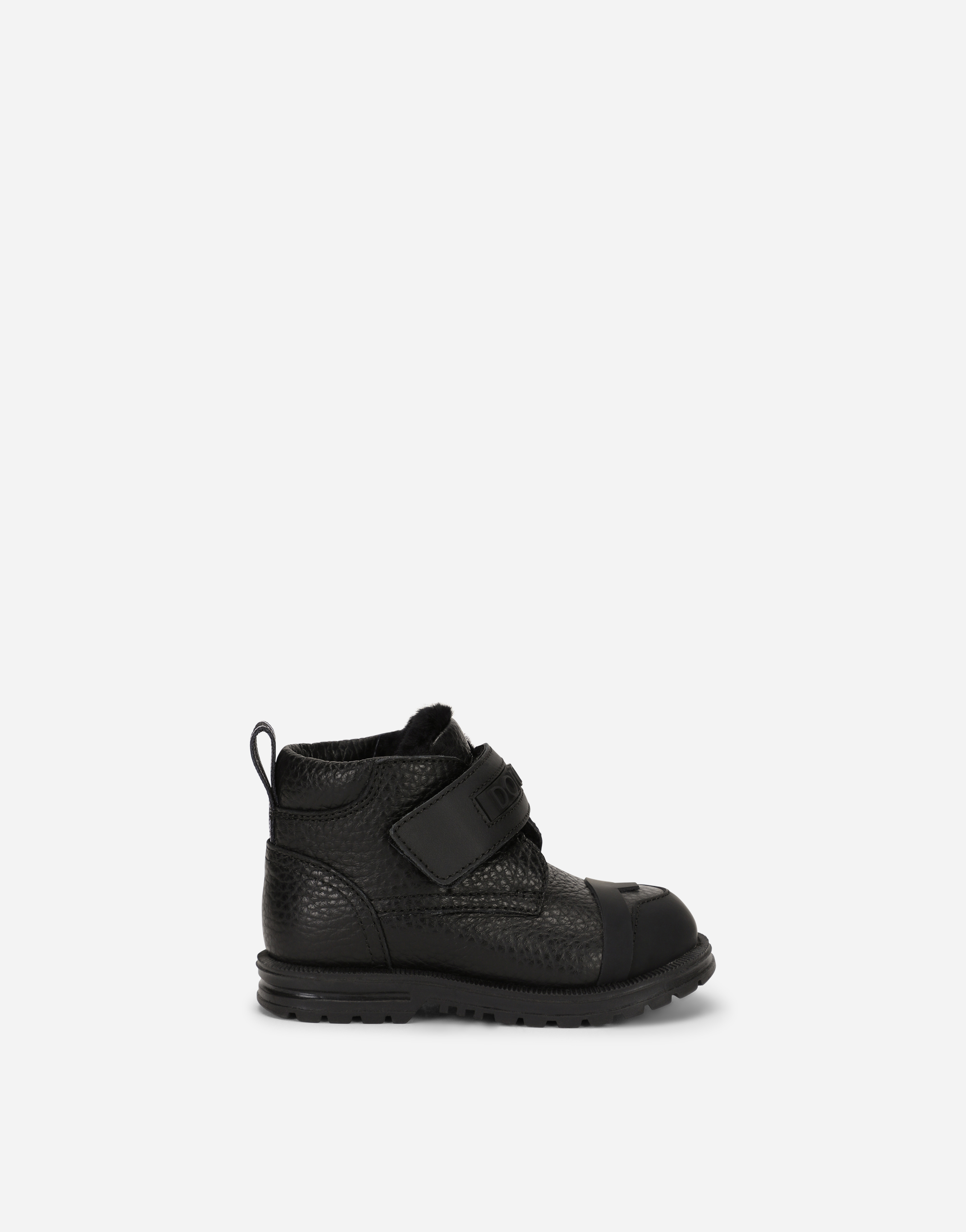 Calfskin ankle boots in Black
