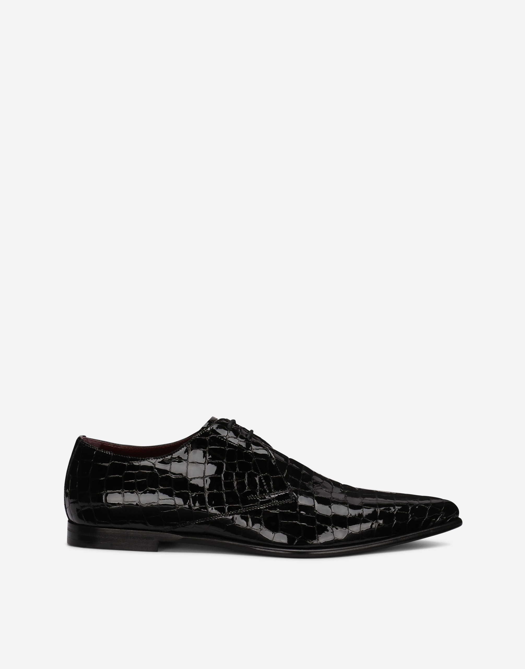 Crocodile-print calfskin Derby shoes in Black