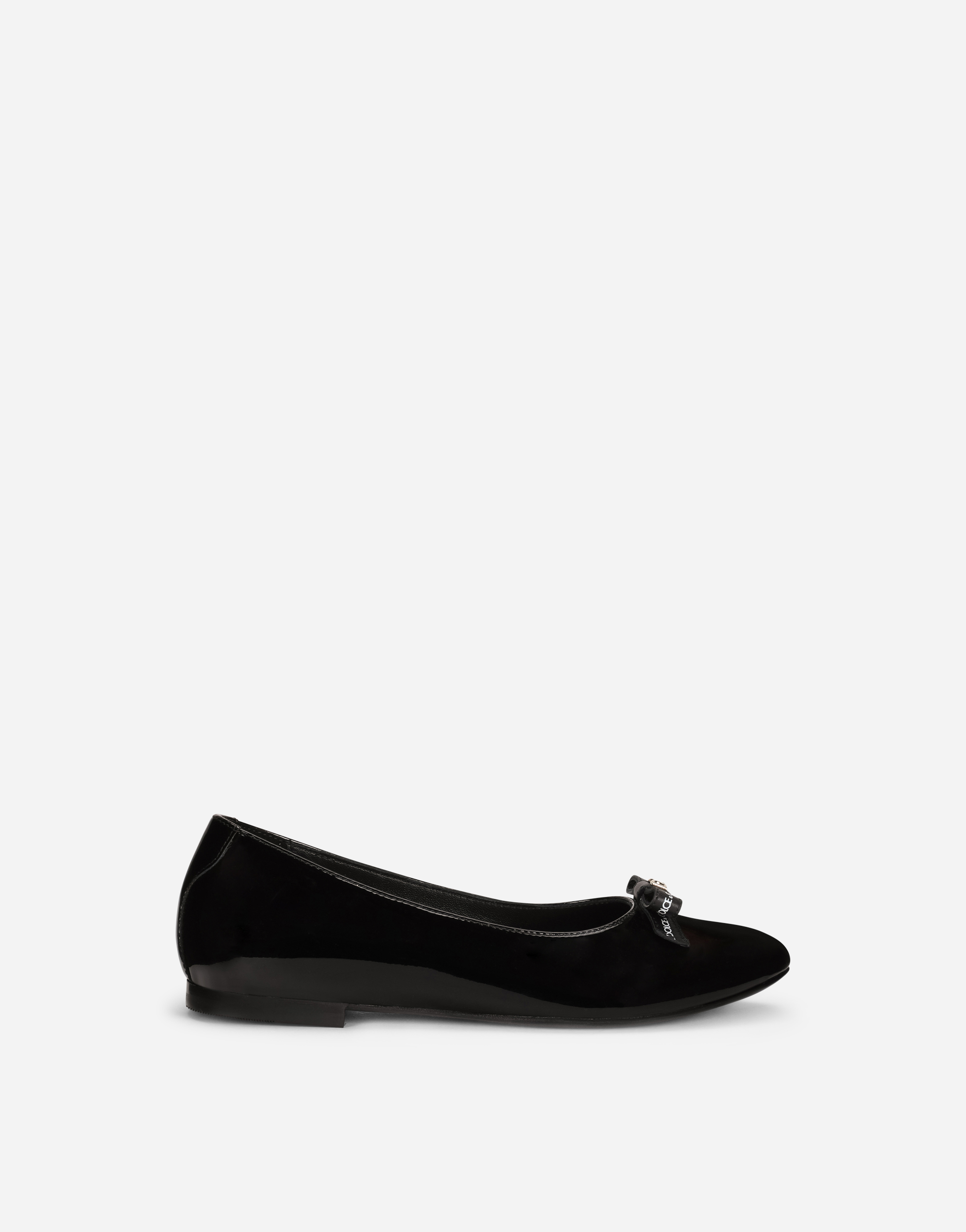 Patent leather ballet flats with bow detail in Black