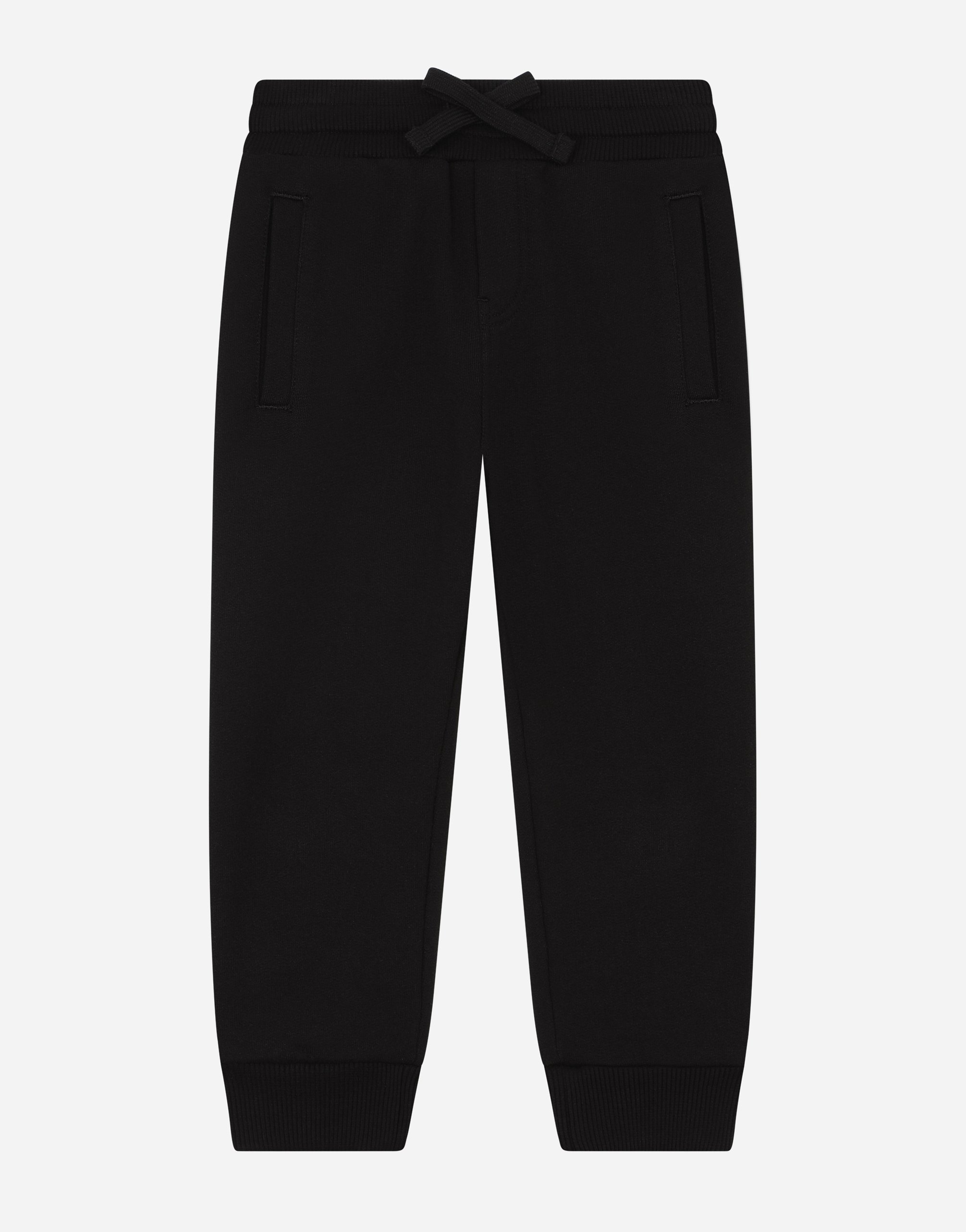 Jersey jogging pants with logo plate in Black