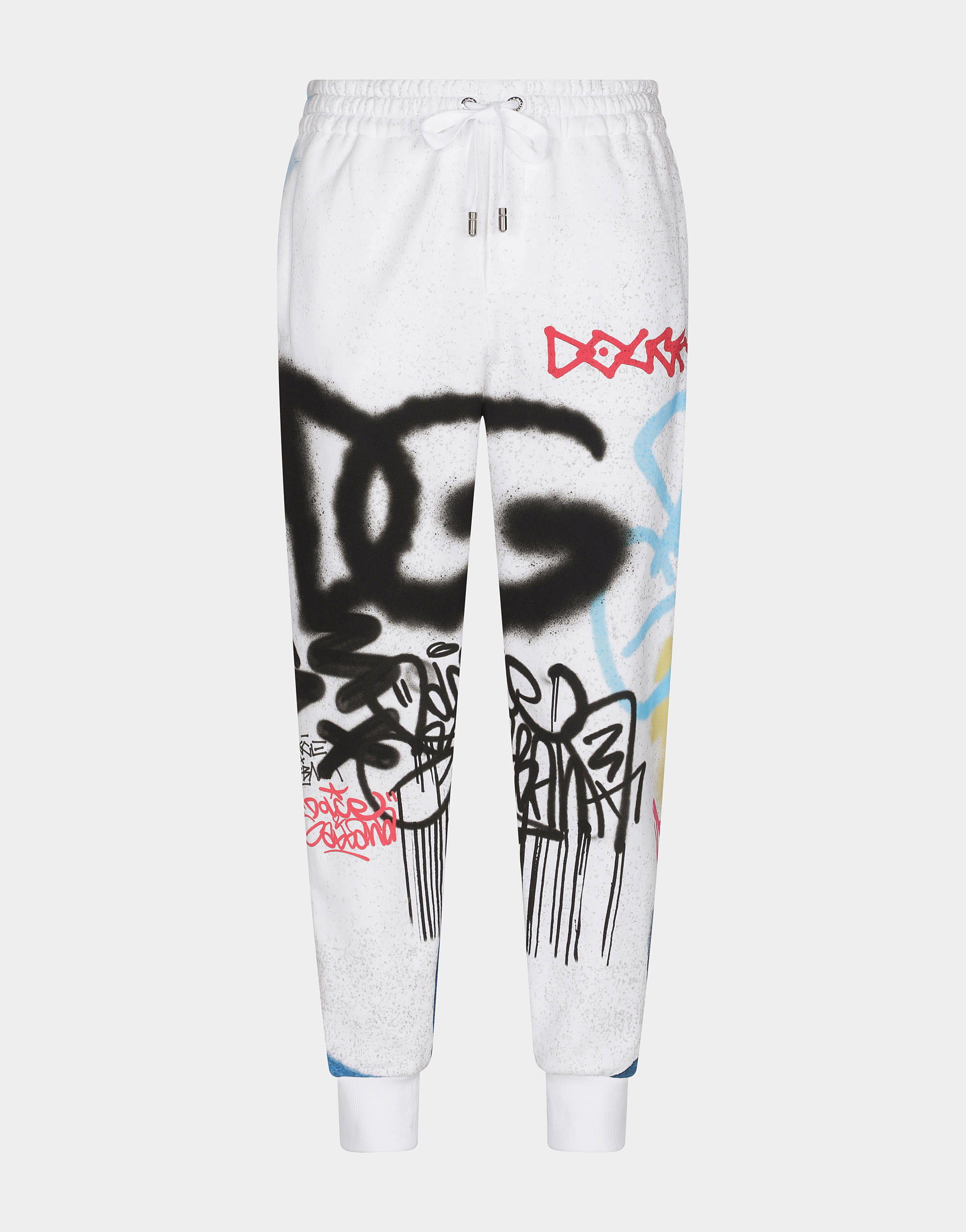Jogging pants with spray-paint graffiti print in Multicolor