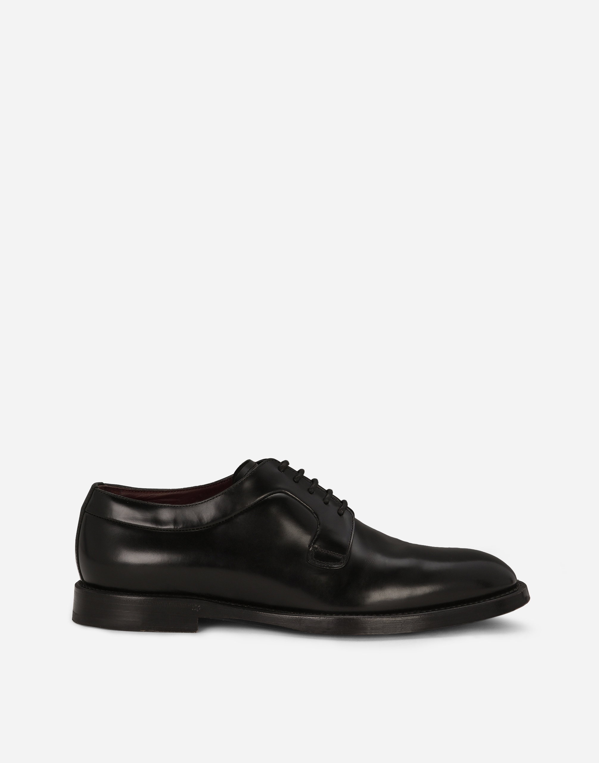 Brushed calfskin derby shoes in Black
