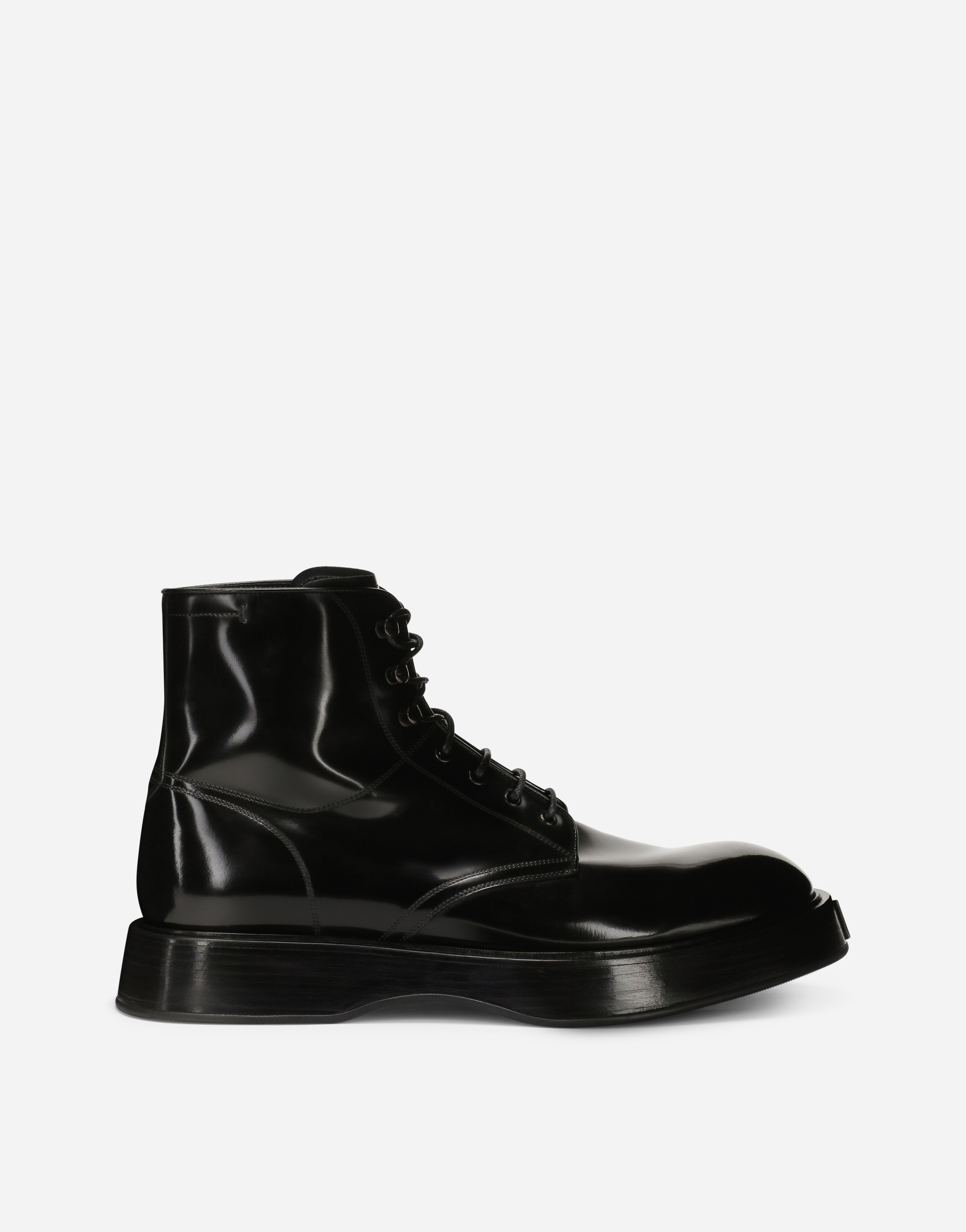 Brushed calfskin ankle boots in Black