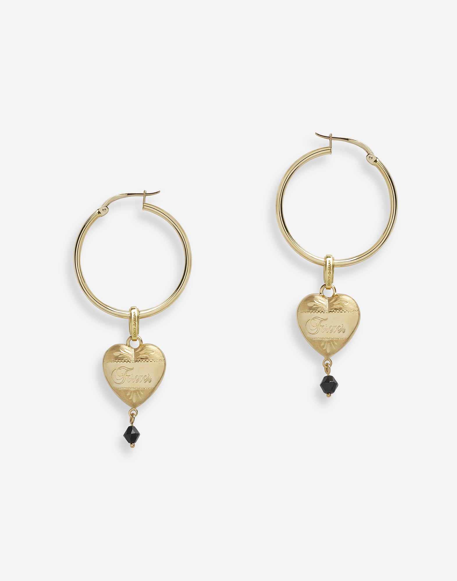 Hoop earrings with heart pendant in Gold
