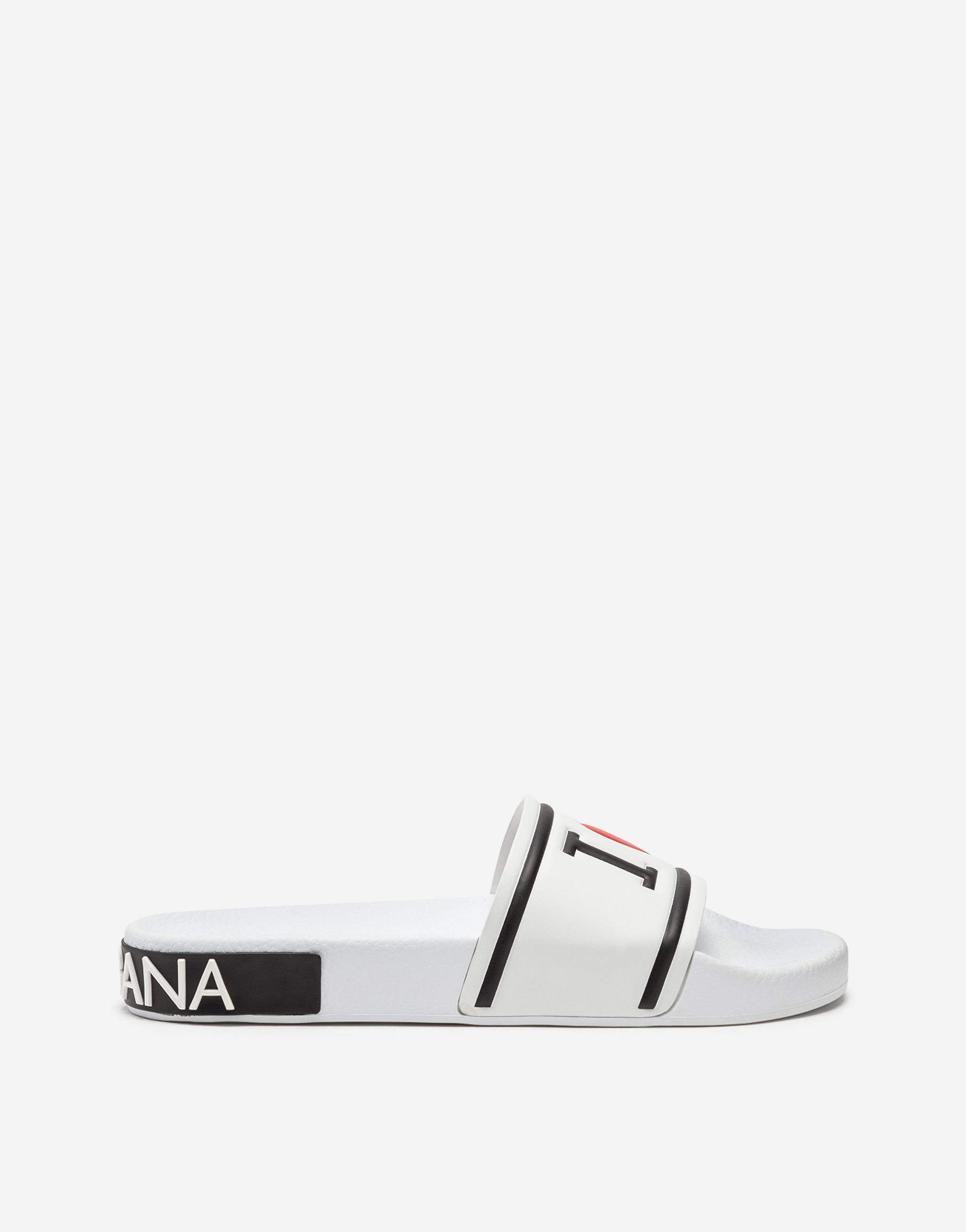 Rubber and calfskin slides with high-frequency detailing in White