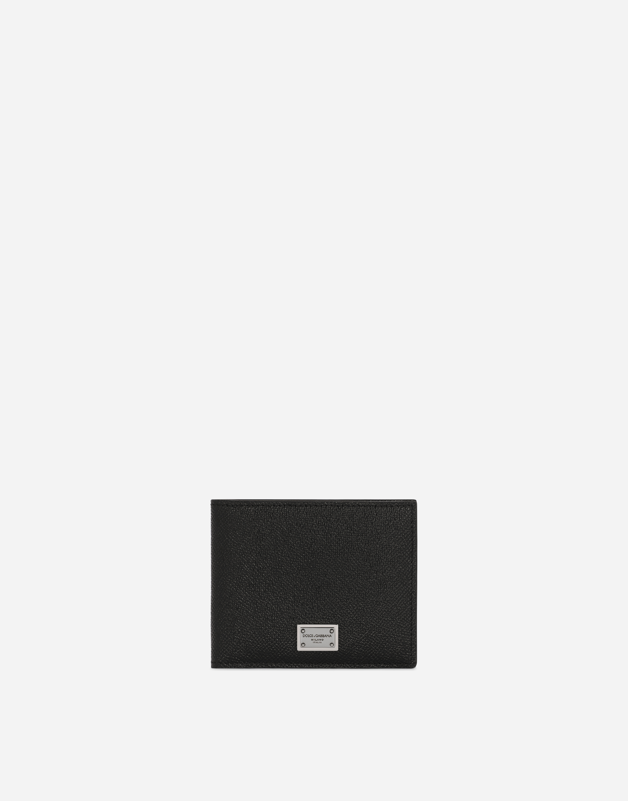 Calfskin bifold wallet with logo tag in Black