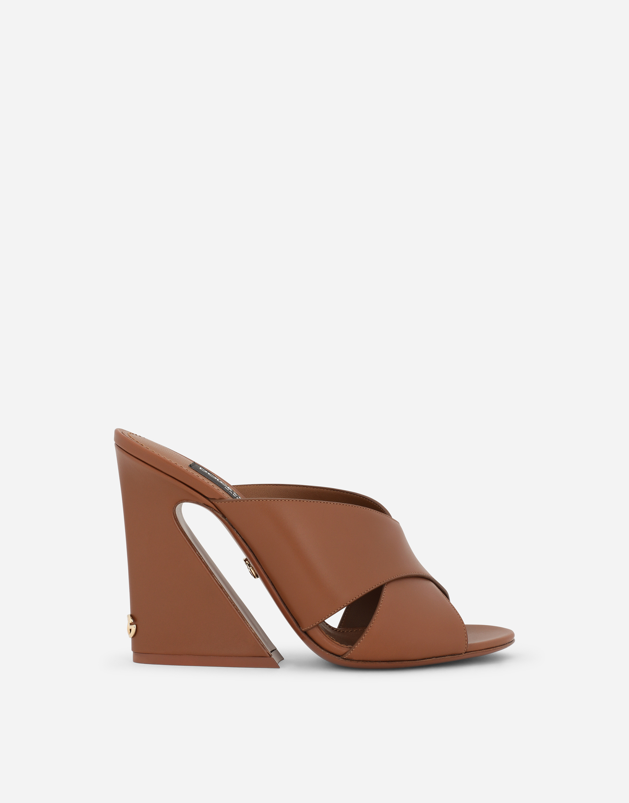 Calfskin mules with geometric heel in Brown