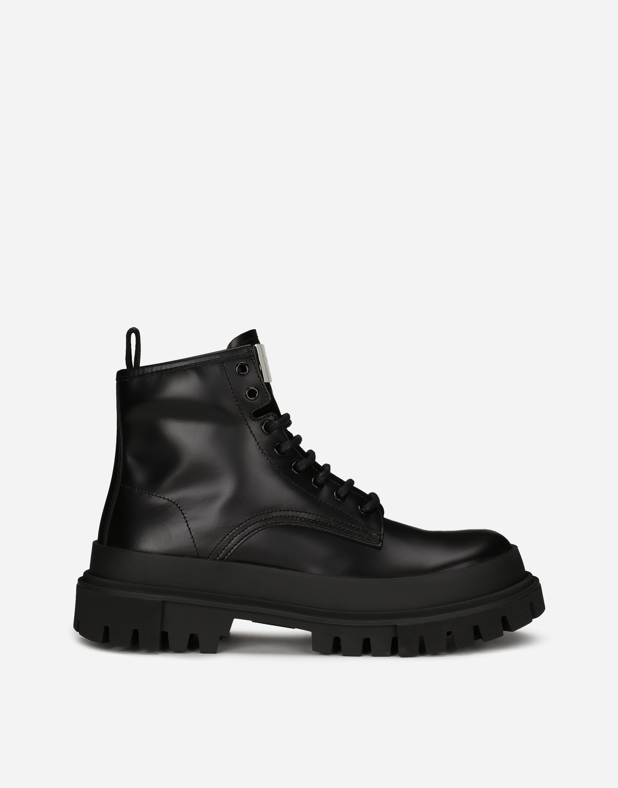 Studded calfskin hi-trekking ankle boots in Black