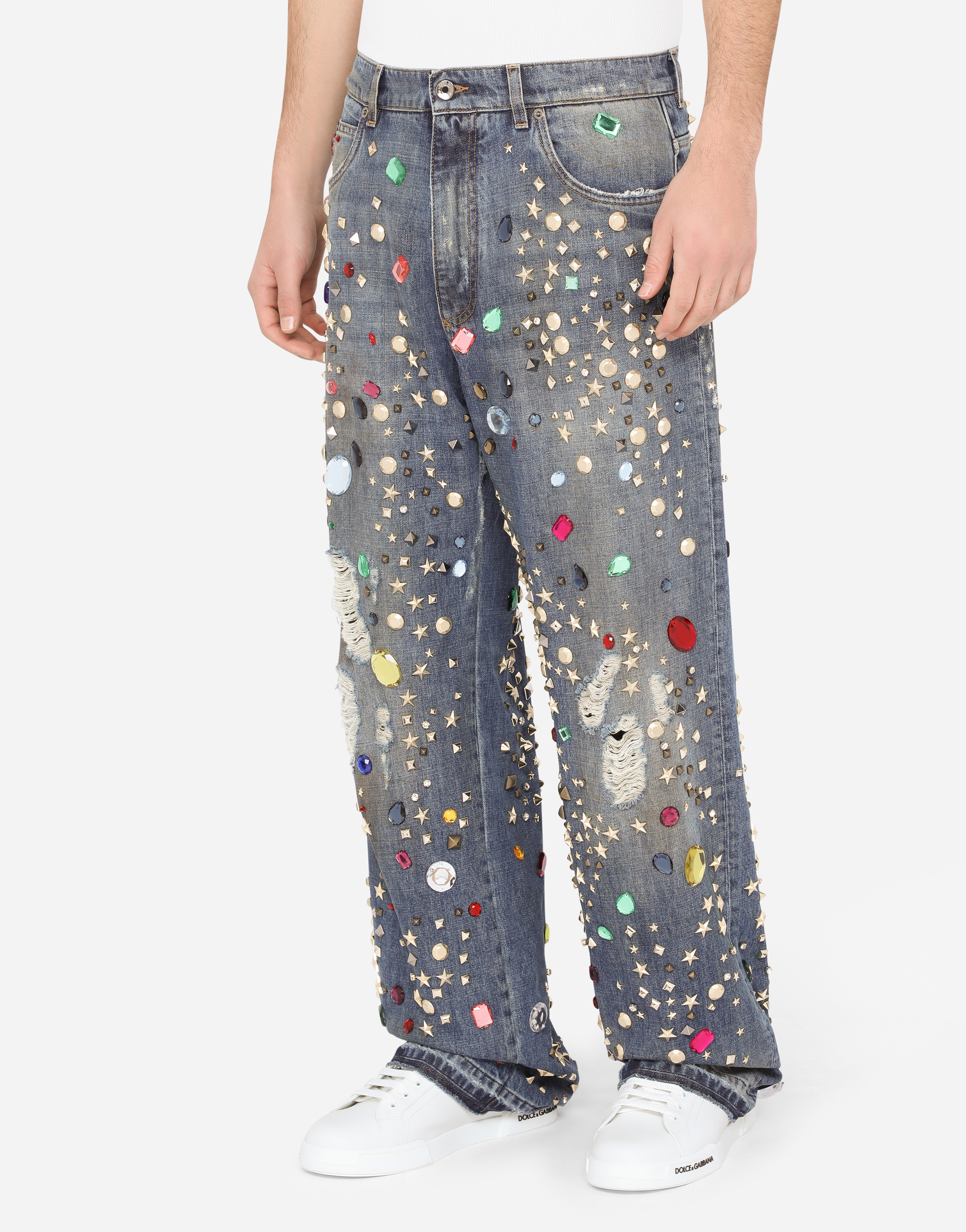Oversize blue wash jeans with crystal and stud embellishment