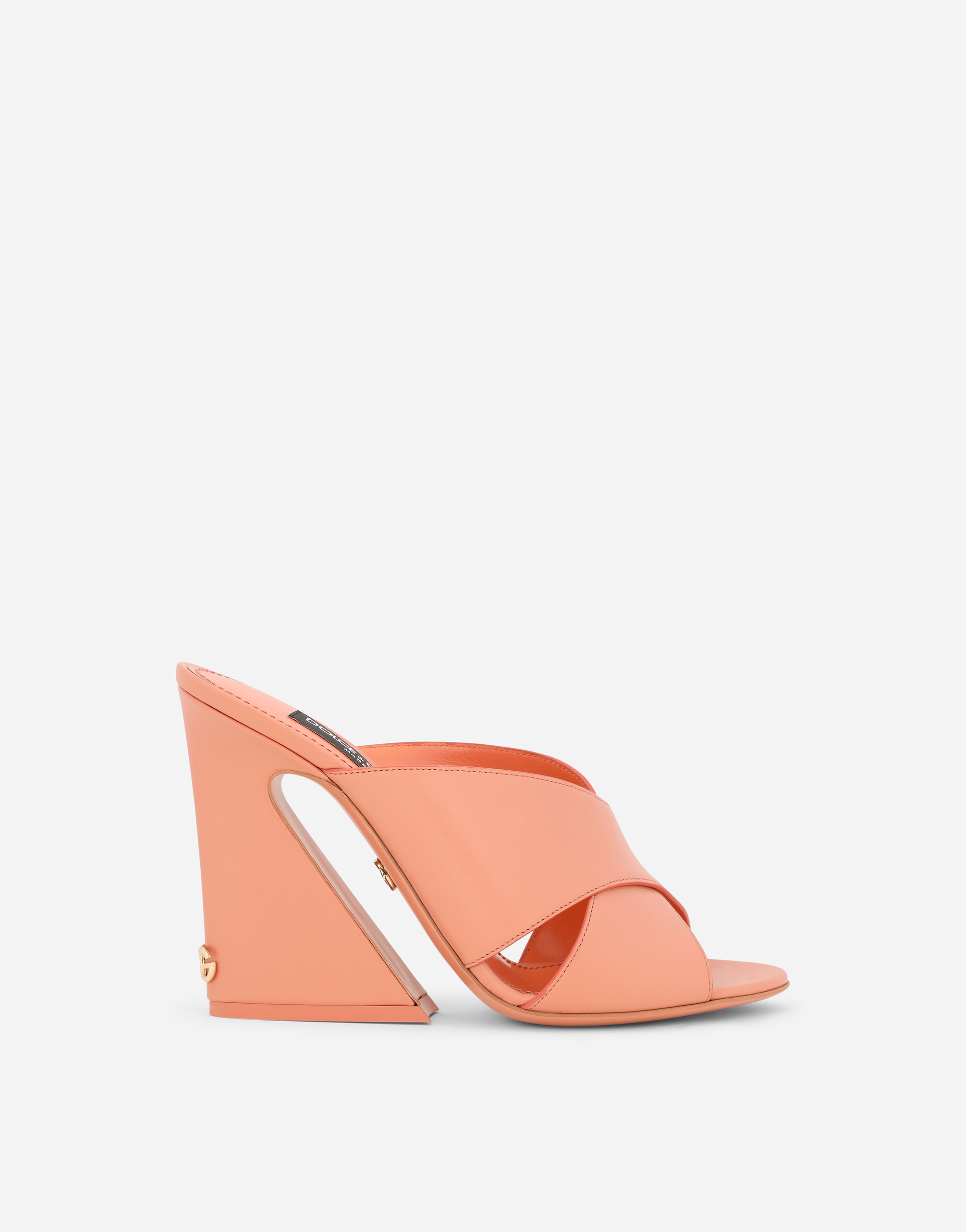 Calfskin mules with geometric heel in Pink