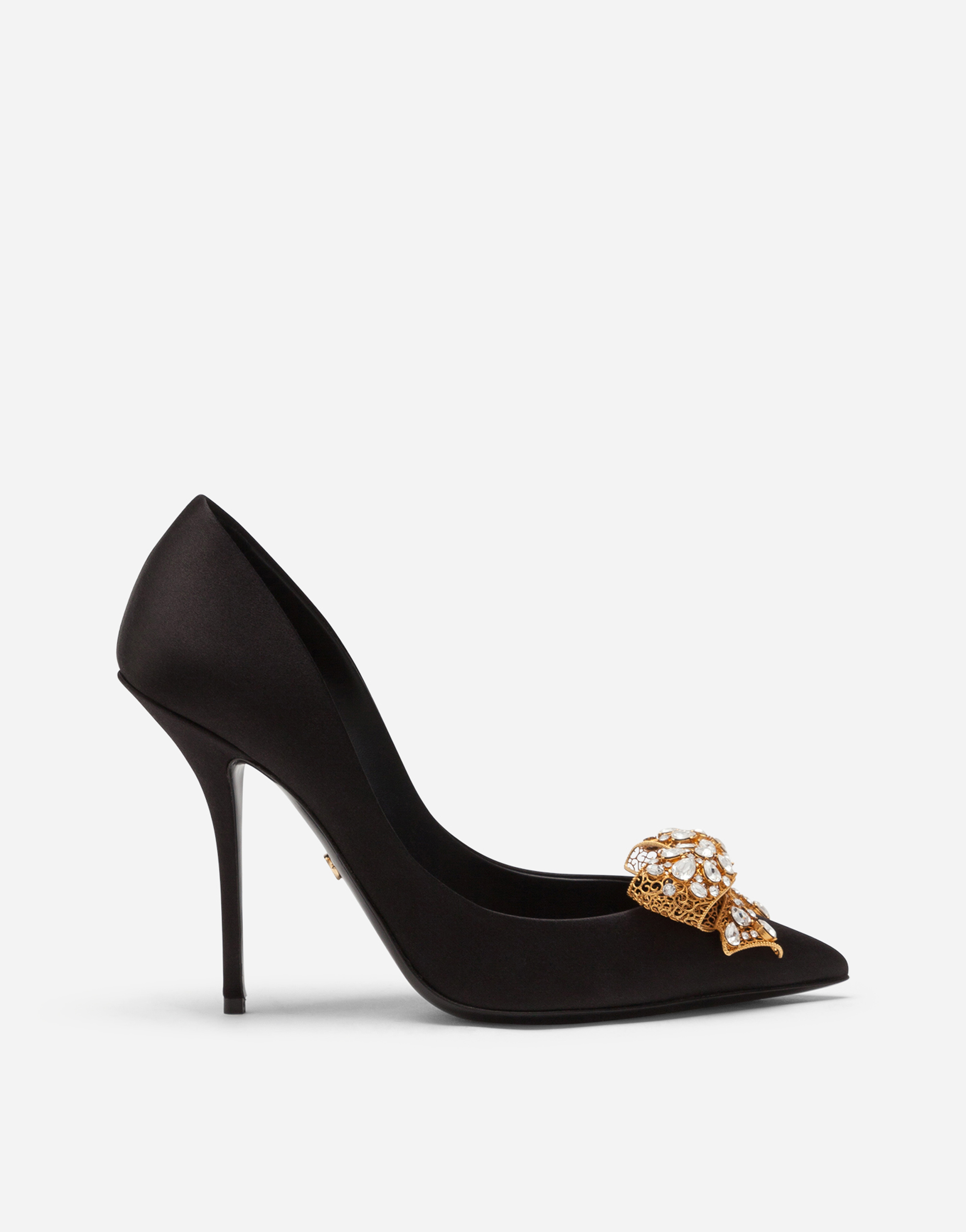 Satin pumps with bejeweled embellishment in Black
