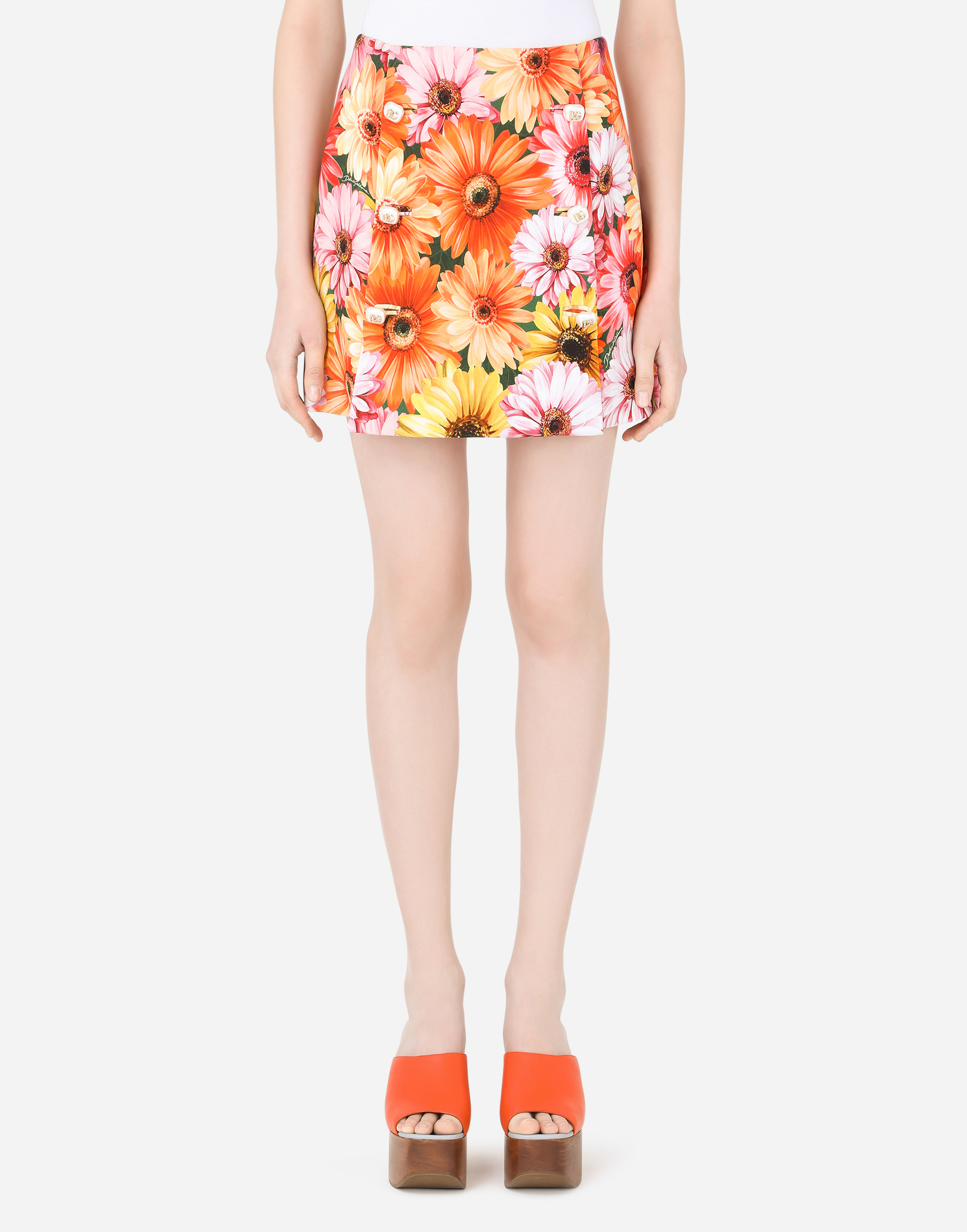 Cady miniskirt with gerbera-daisy print and decorative pearl DG buttons in Multicolor