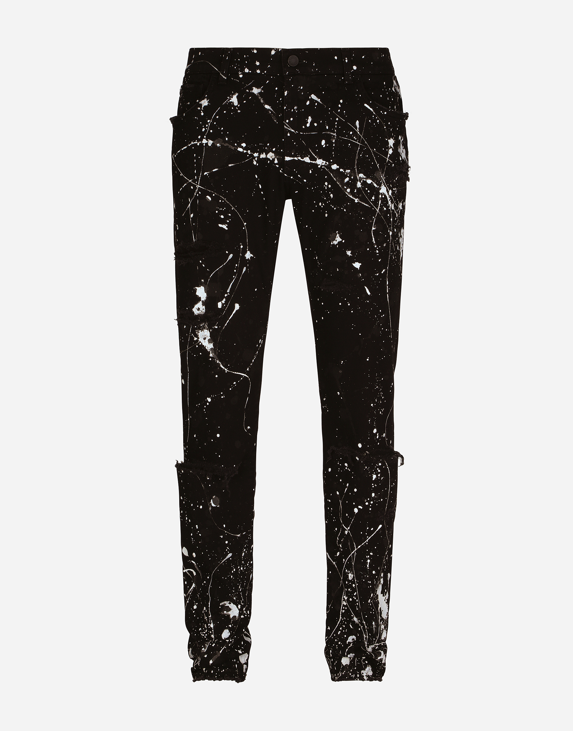 Skinny stretch jeans with rips and splash design in Multicolor